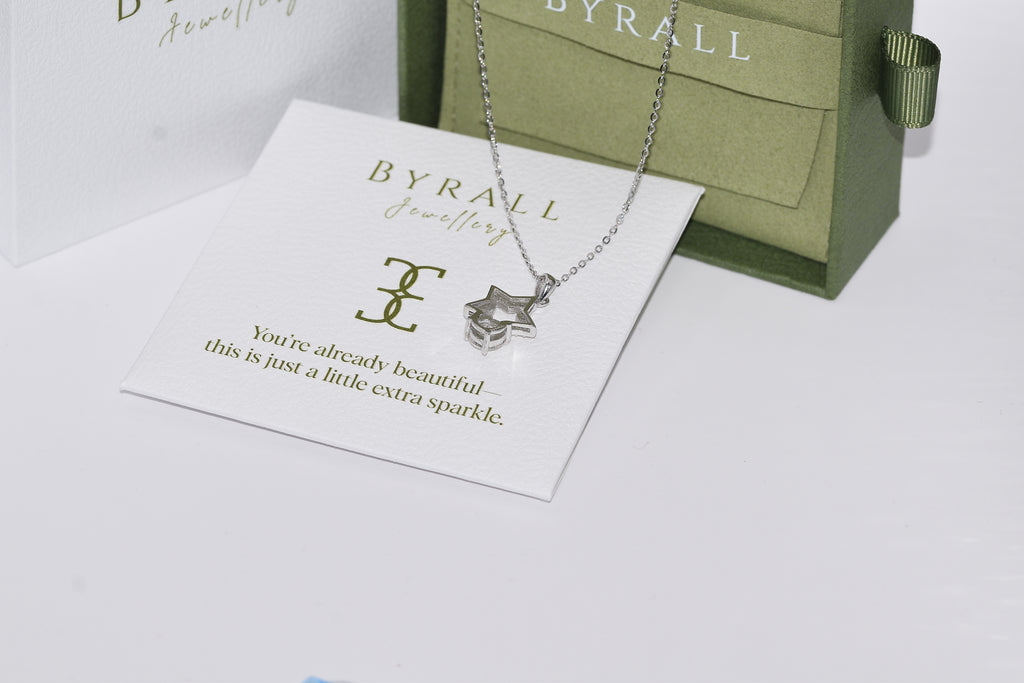 Celeste Drop necklace angle view star moissanite pendant silver S925 Australia — Byrall Jewellery