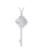 Close-up ornate floral bow VVS1 moissanite key pendant snowflake halo design rhodium silver — Byrall