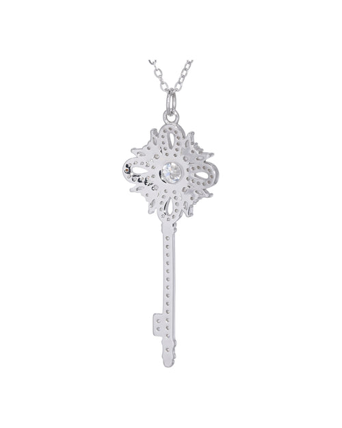 Close-up ornate floral bow VVS1 moissanite key pendant snowflake halo design rhodium silver — Byrall