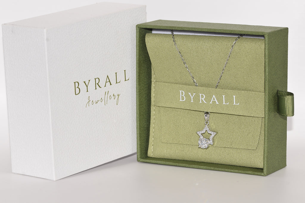 Close-up pavé star pendant 1ct VVS1 round brilliant moissanite drop claw set rhodium silver — Byrall