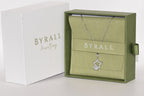 Close-up pavé star pendant 1ct VVS1 round brilliant moissanite drop claw set rhodium silver — Byrall