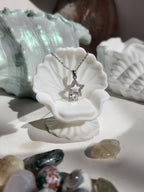 Woman wearing Celeste Drop star moissanite necklace silver, celestial pendant gift for her Australia