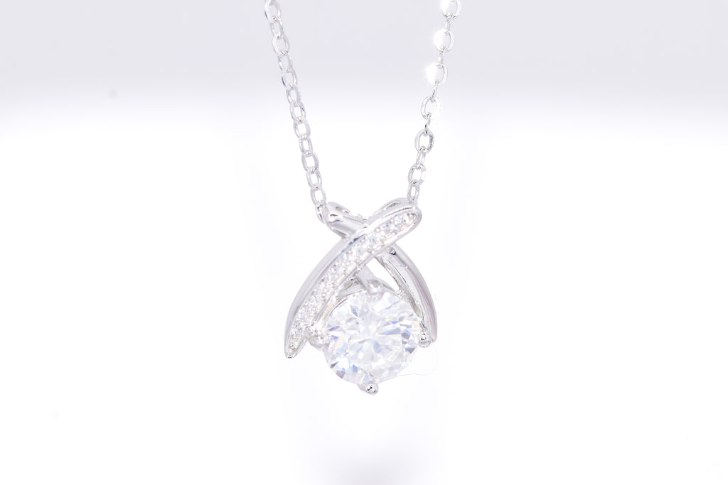 Woman wearing Noir moissanite ribbon necklace silver, elegant solitaire pendant gift for her Australia